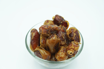 Kurma or dates fruits isolated on white background