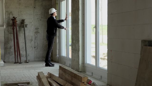 Architect inspects construction from the inside