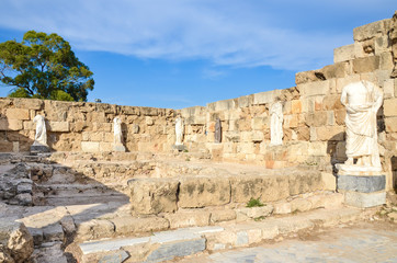 Obraz premium Well preserved ruins of ancient Salamis in Turkish Northern Cyprus with antique statues. Taken on a sunny day with blue sky above. The landmark is a popular tourist attraction.