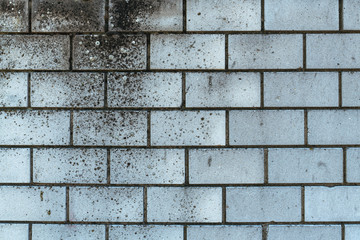 Weathered sand-lime brick wall background