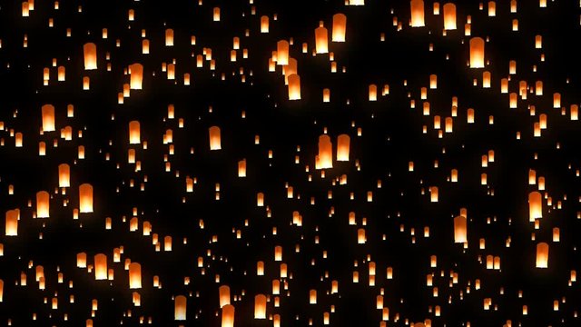Many flying sky lanterns rising up in the night sky during festival. 3-D Seamless looping animation.