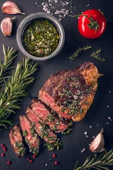 Foto auf Acrylglas Antireflex Juicy tender sous-vide grilled irish beef rump steak with fresh herbs © PawelG Photo