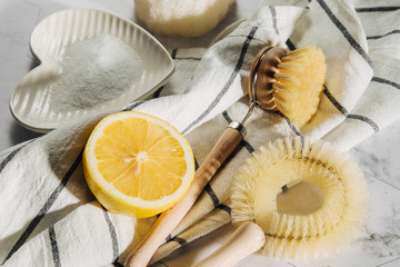 Natural cleaning products lemon and baking soda with bamboo dish brushs. Eco friendly. Zero waste...