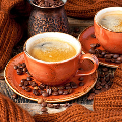 Coffee cups on  wooden background