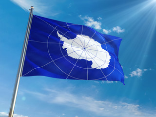 Antarctica National Flag Waving on pole against sunny blue sky background. High Definition