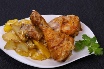 Roasted chicken legs with potato