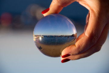 Beach seen through a crystal sphere