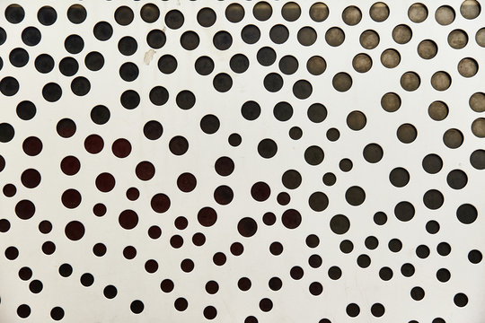 White metal texture with small black holes