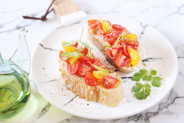 Italian appetizer. Bruschetta with tomatoes and olive oil