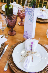 Wedding Setup. Banquet with table and chairs. Decoration, flowers, ware, glass
