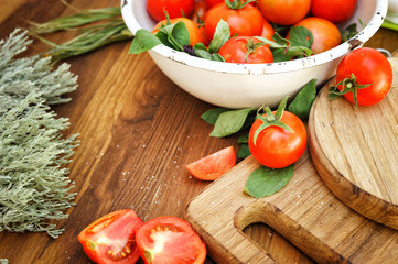 Organic cherry tomatoes in white bowl