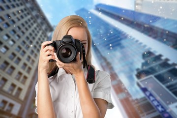 Woman-photographer takes images, isolated