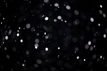 Real snowfall. Design pattern to overlay the image and create a snowfall effect. Deep black color