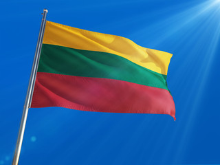 Lithuania National Flag Waving on pole against deep blue sky background. High Definition