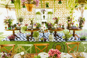 Wedding Setup. Cake tables with sweet, decoration and flowers 