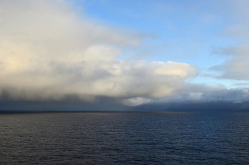 Fototapeta na wymiar Clouds over the Pacific Ocean.