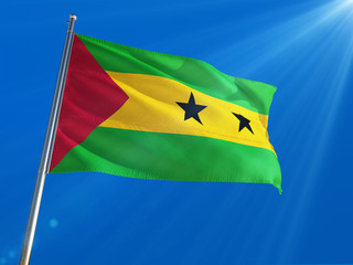 Sao Tome And Principe National Flag Waving on pole against deep blue sky background. High Definition