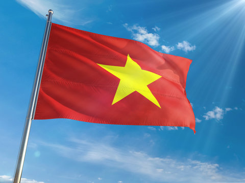 Vietnam National Flag Waving on pole against sunny blue sky background. High Definition