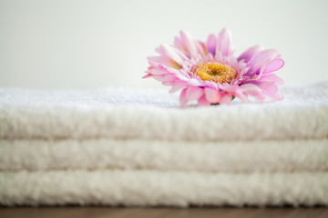 Obraz na płótnie Canvas Spa. White Cotton Towels Use In Spa Bathroom. Towel Concept. Photo For Hotels and Massage Parlors. Purity and Softness. Towel Textile