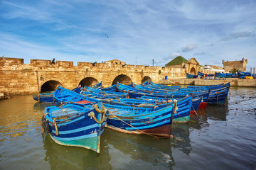Blue fishing boats in the port of Essaouira