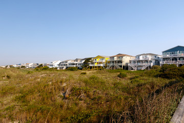 Vacation beach rentals on the green sand dunes, Sunset Beach, North Carolina