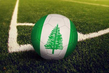 Obraz premium Norfolk Island ball on corner kick position, soccer field background. National football theme on green grass.