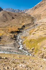Andes valleys inside central Chile at Cajon del Maipo amazing views over snow mountains and glaciers a perfect place for hiking and having some adventure on a remote place with an awe rugged landscape