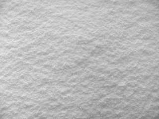 texture of snow, spring corn, birdseye view on snowy surface, use as texture, background for Christmas theme