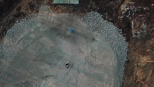 Guy shooting a watermelon with shotgun. Filmed from Drone!