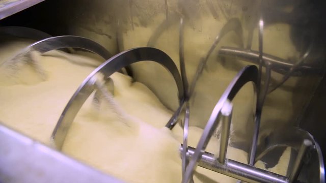Huge flour powder mixer machine rolling ingredients in a bread factory