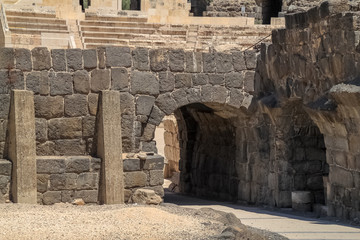 Arched entryway leading into renovated theater of archaeological ruins of Beit She'an