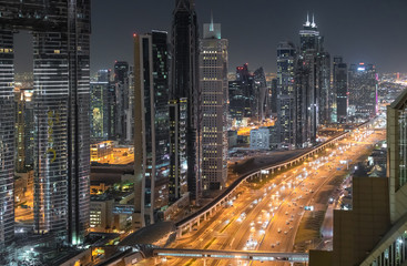 Fototapeta na wymiar Aerial view of cityscape at night in Dubai.UAE 