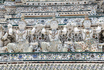 statue at Wat Arun temple in Bangkok, Thailand