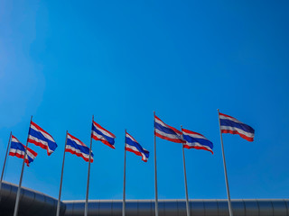 National flags of Thailand and blue sky background.Picture of waving Thai flag of Thailand in blue background.
