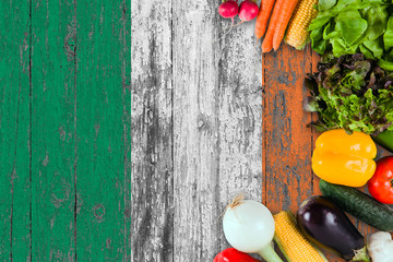 Fresh vegetables from Ireland on table. Cooking concept on wooden flag background.