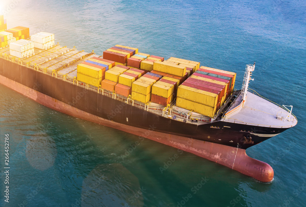 Wall mural aerial view of container ship sailing in the sea carriage the shipment cargo to ports destination, t