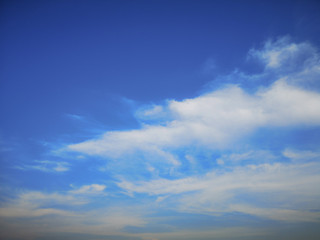 Deep blue sky and white cloud background.Beautiful sky of cirrus clouds.