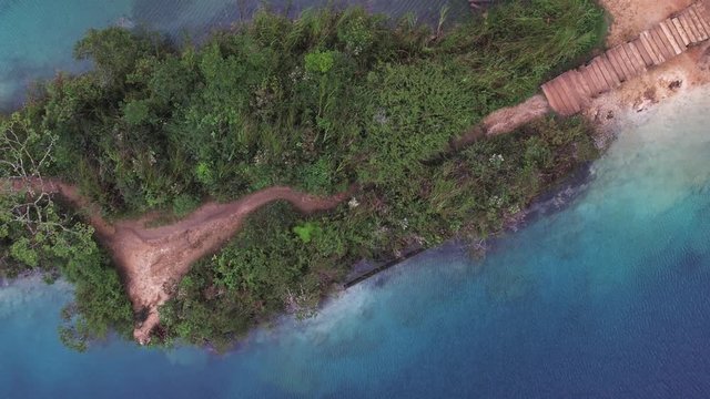 Aerial cenital revealing shot of the Island of Orchids, Pojoj Lake, Montebello National Park, Chiapas.