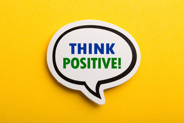 Think Positive Speech Bubble Isolated On Yellow Background