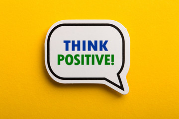 Think Positive Speech Bubble Isolated On Yellow Background