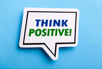 Think Positive Speech Bubble Isolated On Blue Background