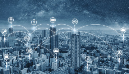 Smart city and internet wireless and networking in the city. Futuristic city with internet network and online media application icons