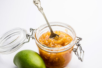 Mango Chunda or Sakhar Amba is a traditional indian summer recipe made using accha aam preserved in sugar syrup for days. selective focus