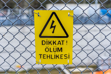 danger of death on yellow background