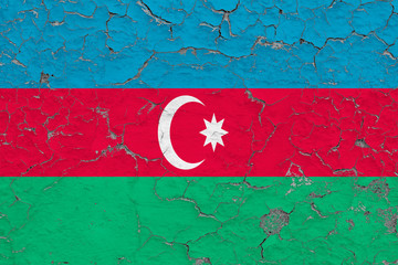 Flag of Azerbaijan painted on cracked dirty wall. National pattern on vintage style surface.