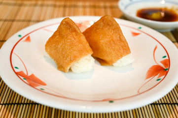 Inari sushi, deep fried tofu filled with rice (Japanese food)