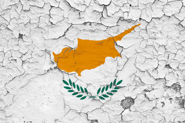Flag of Cyprus painted on cracked dirty wall. National pattern on vintage style surface.