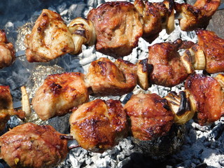  cooking kebabs on the grill. Caucasian kitchen