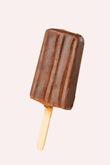 Chocolate popsicle on the sticks, frozen juice.