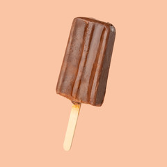 Chocolate popsicle on the sticks, frozen juice. Bright color, summer mood. Ice cream, freshness, Isolate, on a pink background